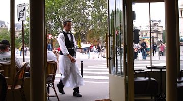 waiter at a busy Paris cafe