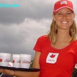 beautiful Canadian girl serving beer