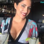 Hot sexy bartender serving margaritas