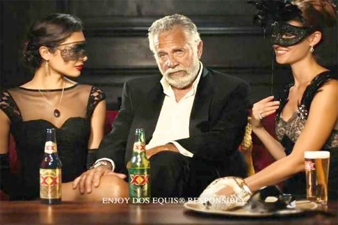 World's Most Interesting Man with two women