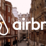 Airbnb logo city scene