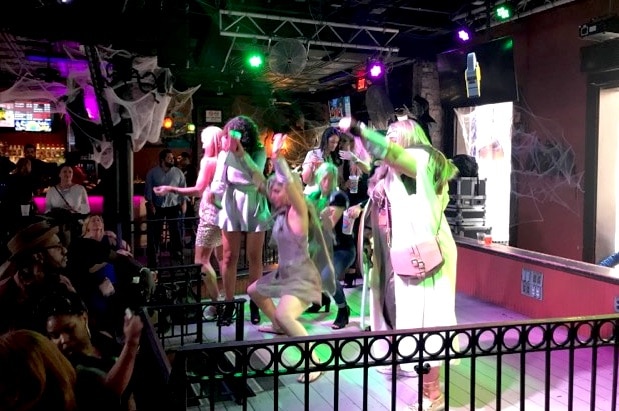 New Orleans Bourbon Street bar girls dancing