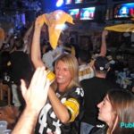 Pittsburgh Steelers fans waving towel