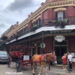New Orleans horse-drawn carriage French Quarter building