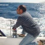 Sailing Pacific Ocean-rough seas trimming sail