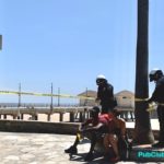 Huntington Beach closure cops police tape & beachgoers