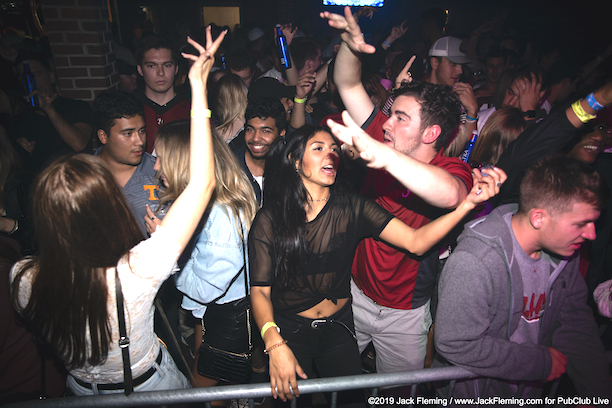 College students partying in a bar