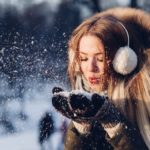 woman in earmuffs in winter