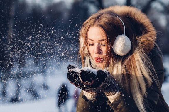 woman in earmuffs in winter
