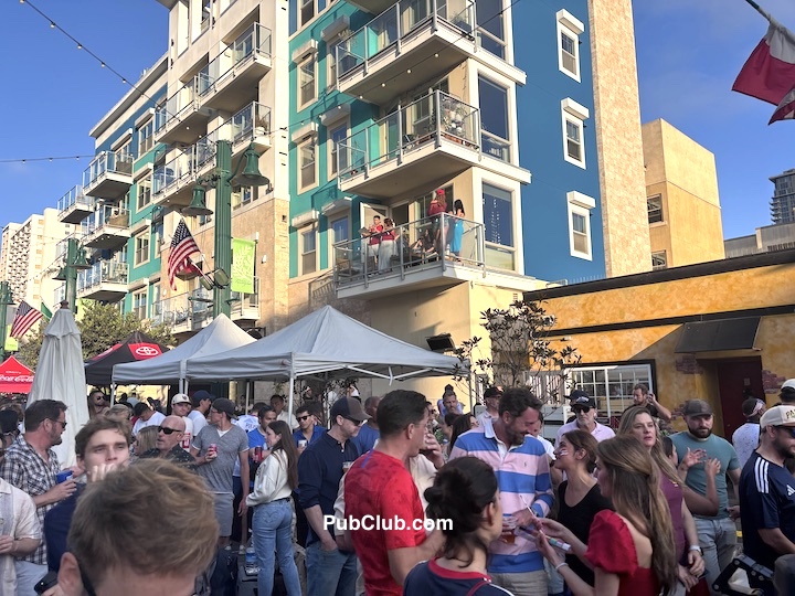 Fans watch the San Diego World Cup viewing party in Little Italy from a balcony Fans watch the San Diego World Cup viewing party in Little Italy from a balcony