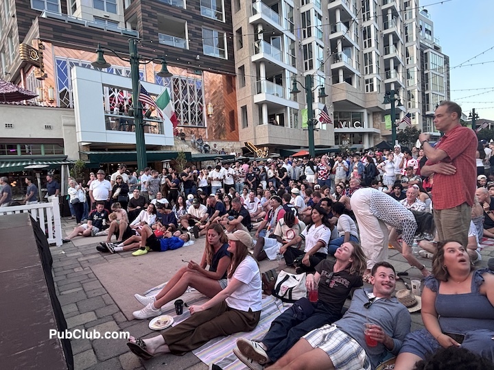 Little Italy World Cup viewing party San Diego fans watching on beach towels Little Italy World Cup viewing party San Diego fans watching on beach towels