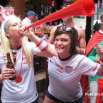 World Cup watch party girls blowing into horn