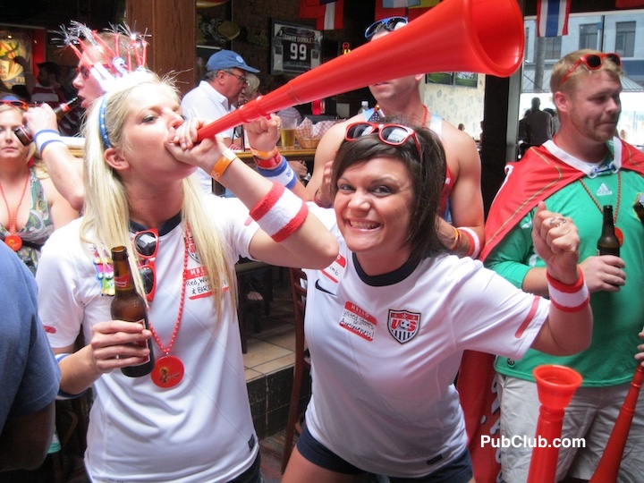 World Cup watch party girls blowing into horn