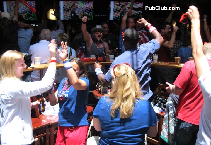 fans celebrate a goal in a World Cup bar fans celebrate a goal in a World Cup bar