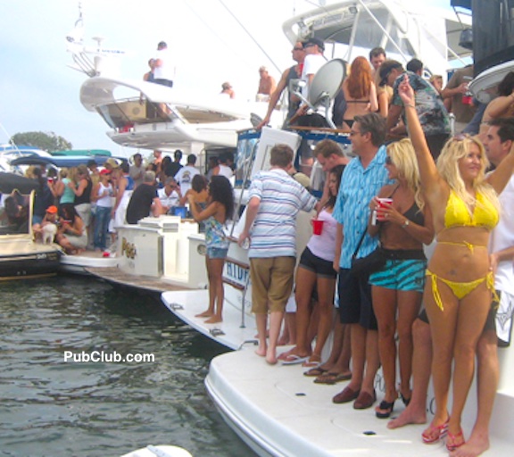 People on boats partying Newport Beach tie-up party