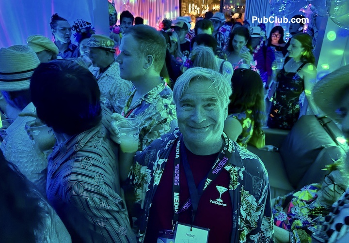 The Nightlife blogger grooving at a Tiki Oasis suite theme party