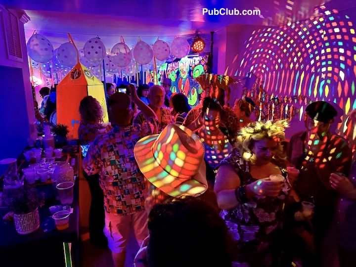 The scene inside a psychedelic suite party at Tiki Oasis